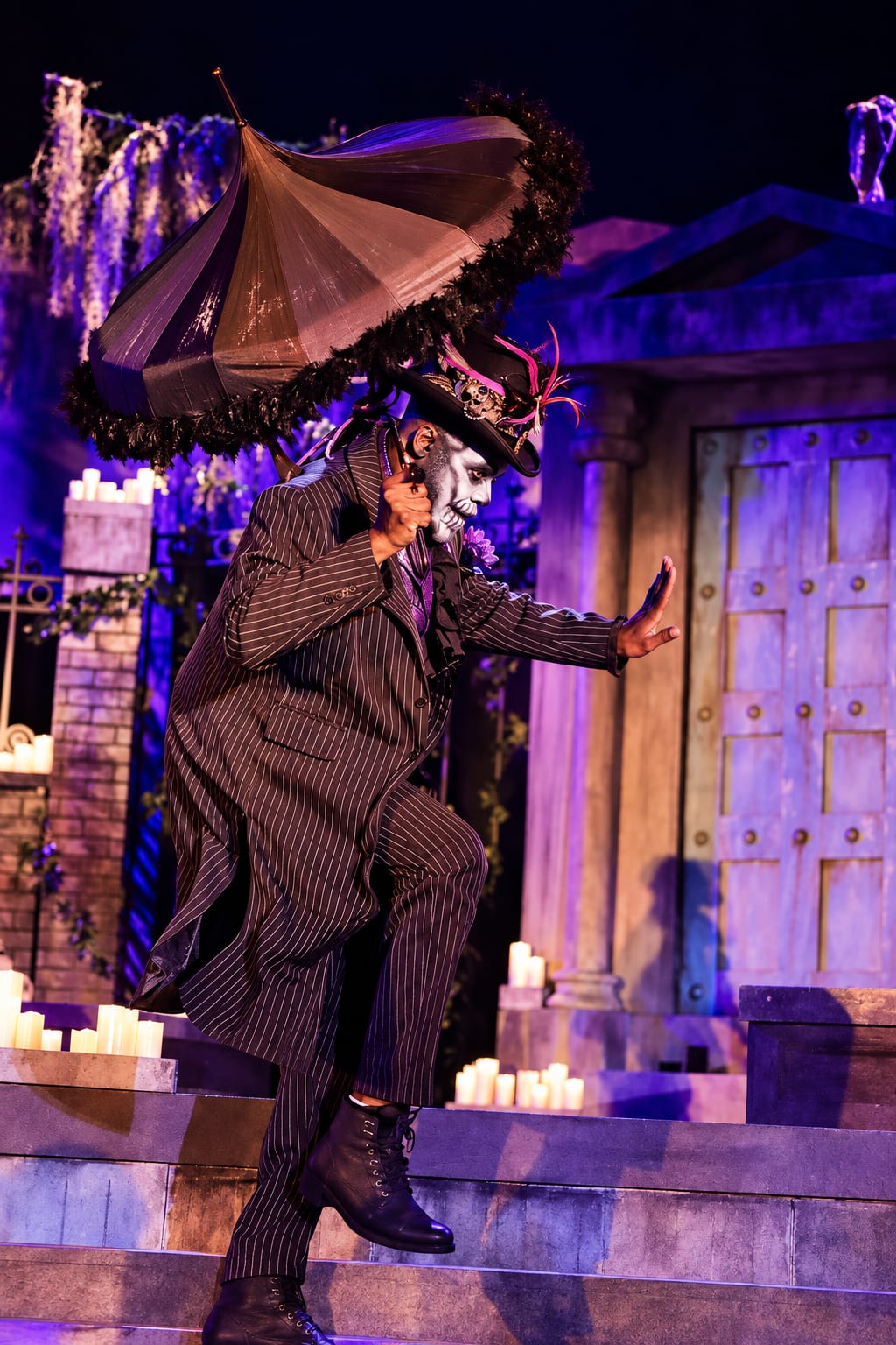 Dedrick Bonner as Baron Samedi opens his parasol to lead the Second Line — Voodoo: Bayou's Edge, Knott's Scary Farm 2026